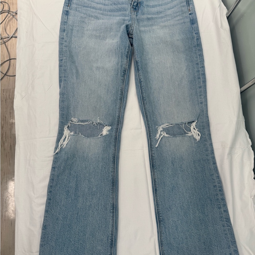 Women's Distressed Blue Jeans